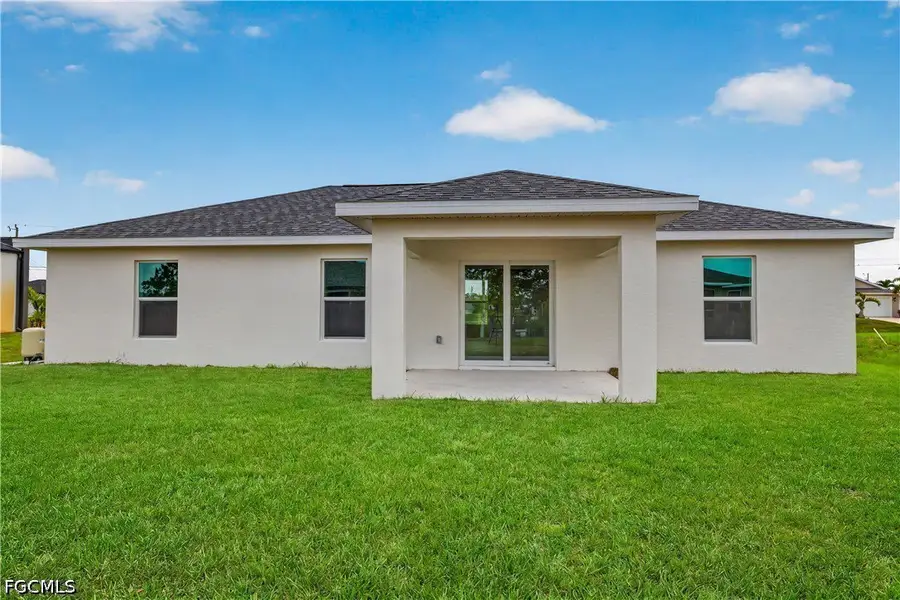 Exterior details and patio area of a home in Cape Coral, Cape Coral (Image 3).