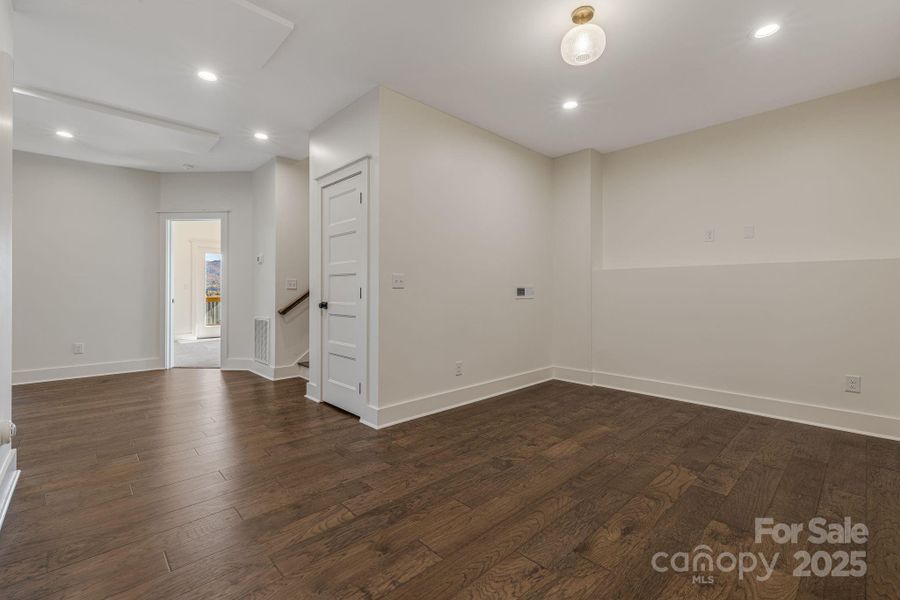 Spacious, unfurnished interior of a new home in , Black Mountain (Image 18).