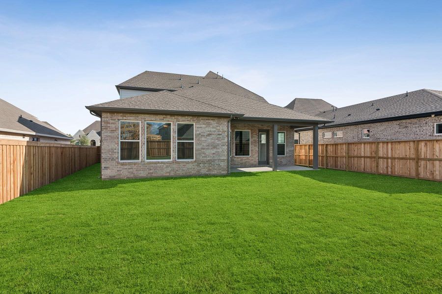 Exterior details and patio area of a home in Dunham Pointe 50' Homesites, Cypress (Image 3). Exterior details and patio area of a home in Dunham Pointe 50' Homesites, Cypress (Image 3).