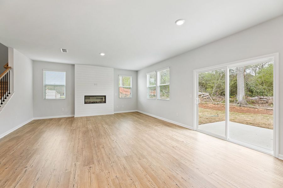 A room with a wood floor and a wood floor. A room with a wood floor and a wood floor.
