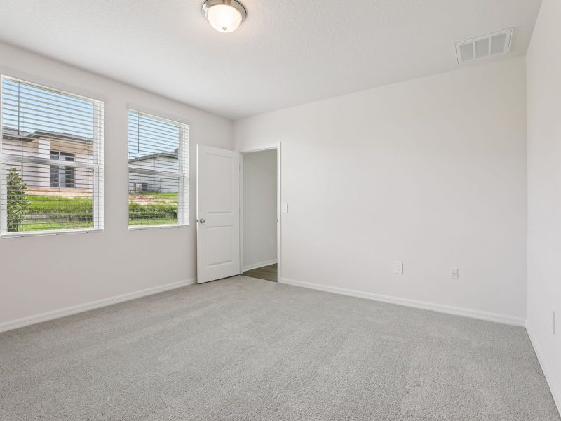 Spacious, unfurnished interior of a new home in Springs at Lake Alfred - Classic Series, Lake Alfred (Image 8).