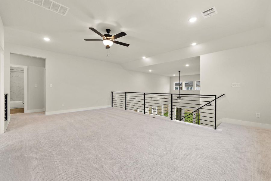 Spacious, unfurnished interior of a new home in Blackhawk in Pflugerville, Pflugerville (Image 27).