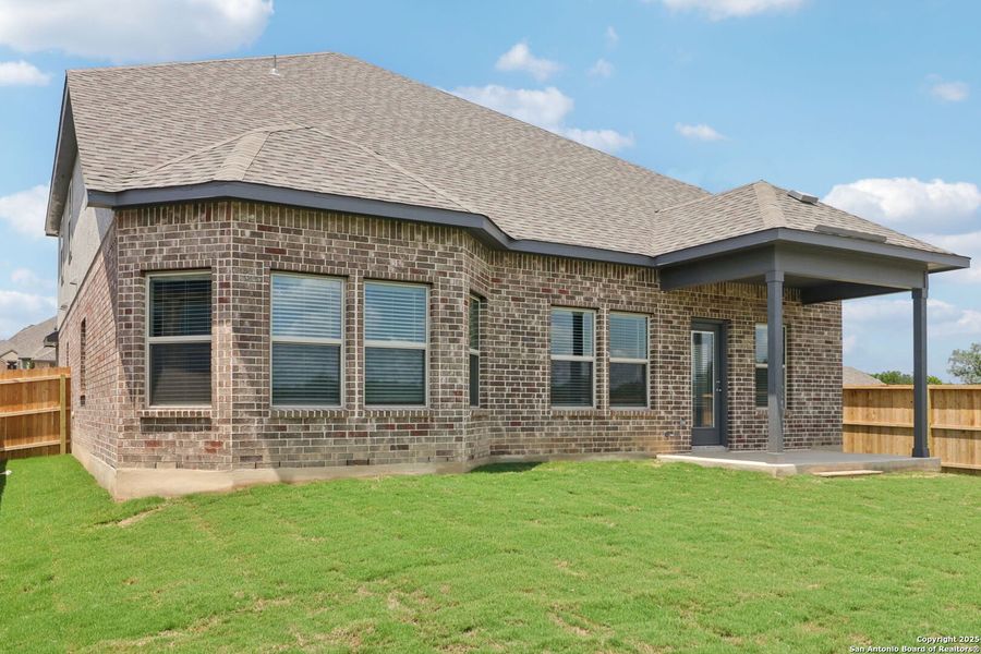 Front exterior of a new home in Arcadia Ridge - Classic Series, San Antonio, TX, highlighting curb appeal (Image 29).