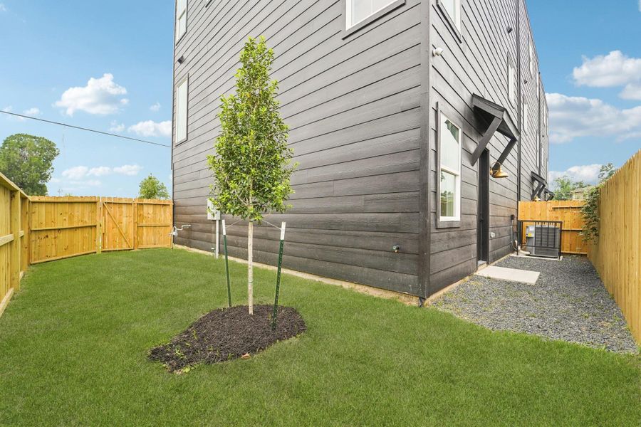 Exterior details and patio area of a home in , Houston (Image 3).