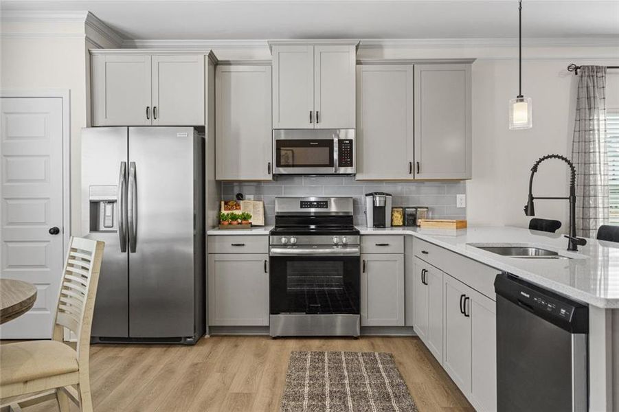 Furnished interior view inside a new home in Trinity Station, Auburn (Image 10).