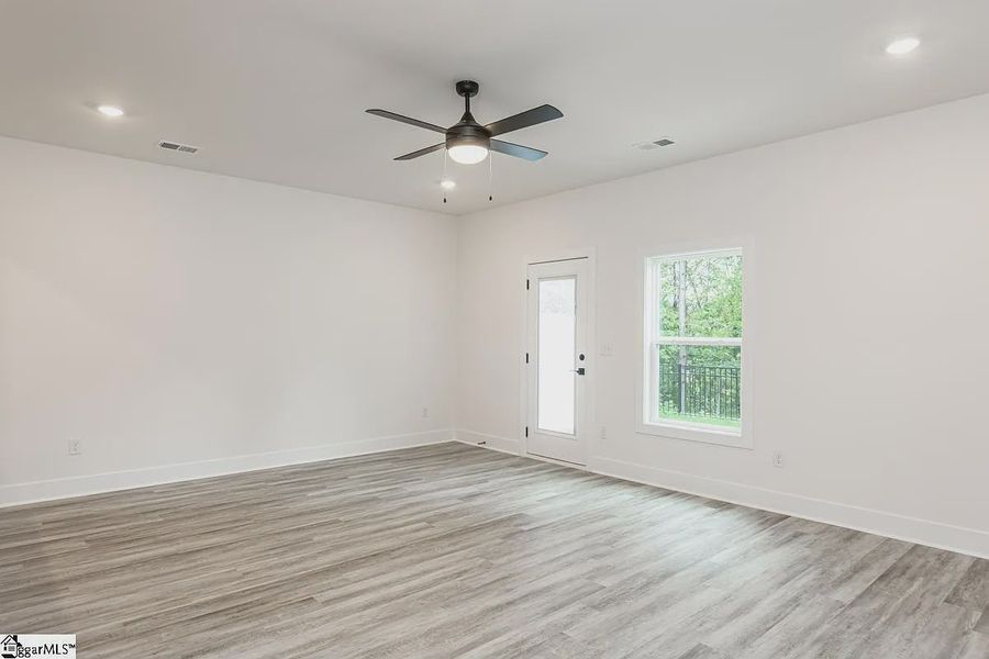 Representative unfurnished interior of a home built from the 1568 Townhome by Adams Homes in Parkstone Place Townhomes, Roebuck (Image 11). Representative unfurnished interior of a home built from the 1568 Townhome by Adams Homes in Parkstone Place Townhomes, Roebuck (Image 11).