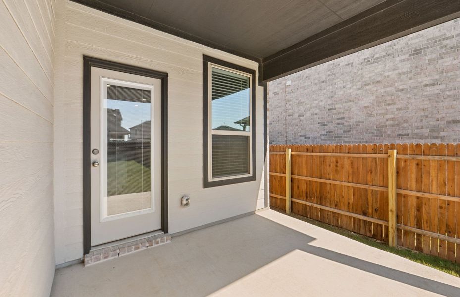 Exterior details and patio area of a home in Saddleback at Santa Rita Ranch, Liberty Hill (Image 29). Exterior details and patio area of a home in Saddleback at Santa Rita Ranch, Liberty Hill (Image 29).