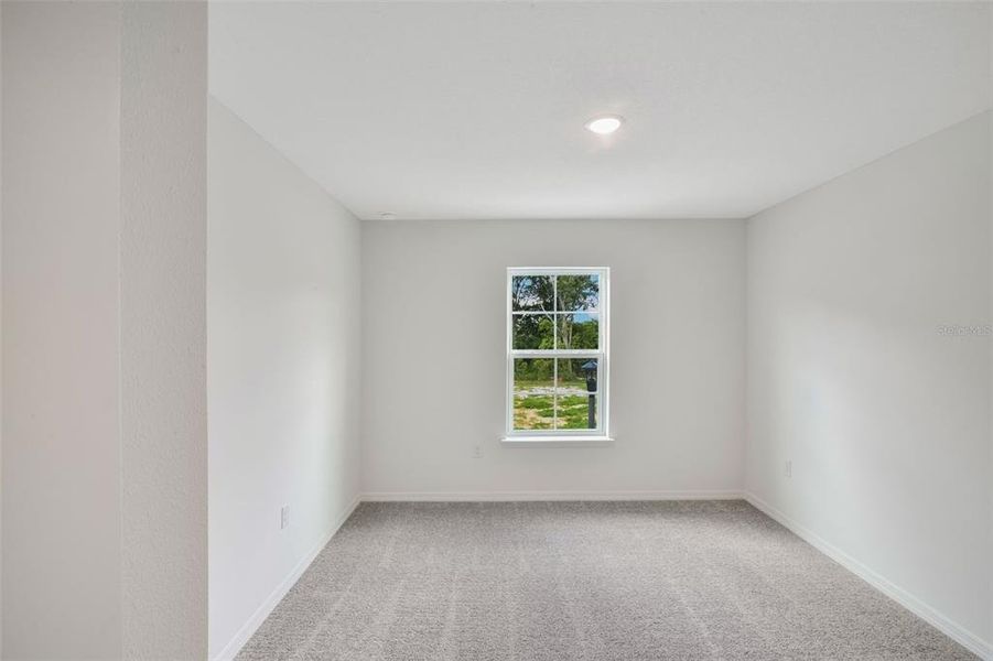 Spacious, unfurnished interior of a new home in Delaney Reserve, Deland (Image 29).