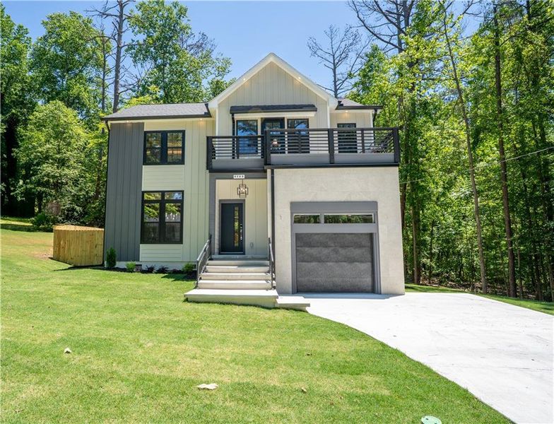 Front exterior of a new home in , Snellville, GA, highlighting curb appeal (Image 2).
