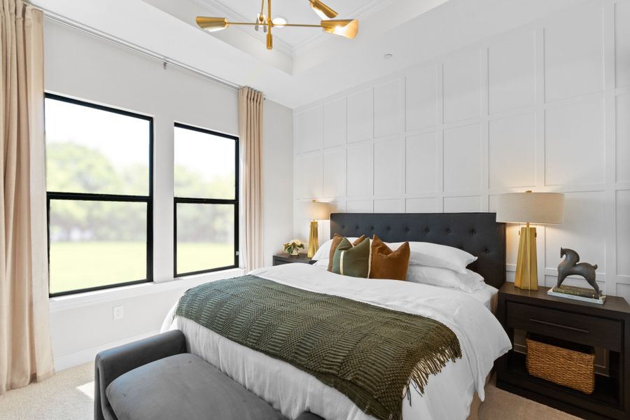 Primary suite with decorative feature wall Primary suite with decorative feature wall