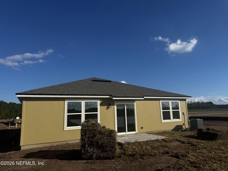 Exterior details and patio area of a home in The Arbors, Jacksonville (Image 4).
