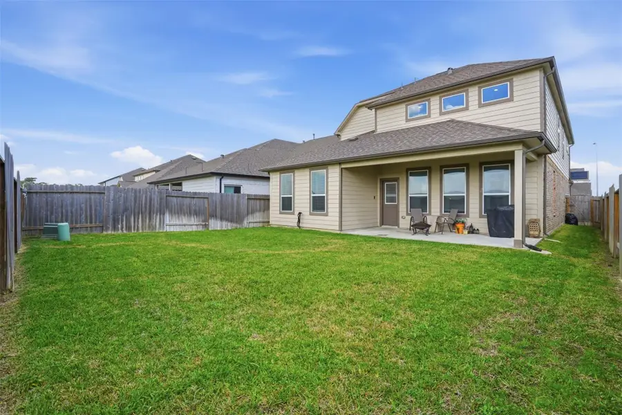 Exterior details and patio area of a home in Sheldon Ridge, Houston (Image 3).