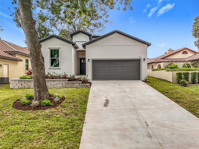 Front exterior of a new home in , Eustis, FL, highlighting curb appeal (Image 16).