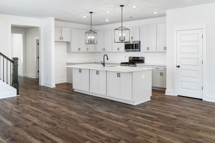 Representative furnished interior of a home built from the St. Ledger by Hunter Quinn Homes in Horry County Homes, Myrtle Beach (Image 8). Representative furnished interior of a home built from the St. Ledger by Hunter Quinn Homes in Horry County Homes, Myrtle Beach (Image 8).