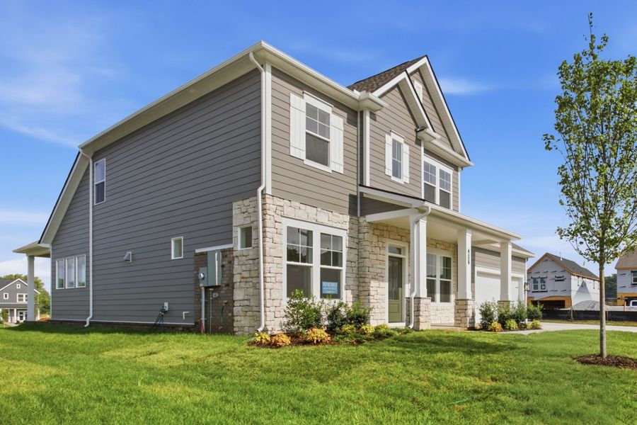 Front exterior of a new home in Heritage Green – The Signature Collection, Columbia, TN, highlighting curb appeal (Image 2). Front exterior of a new home in Heritage Green – The Signature Collection, Columbia, TN, highlighting curb appeal (Image 2).