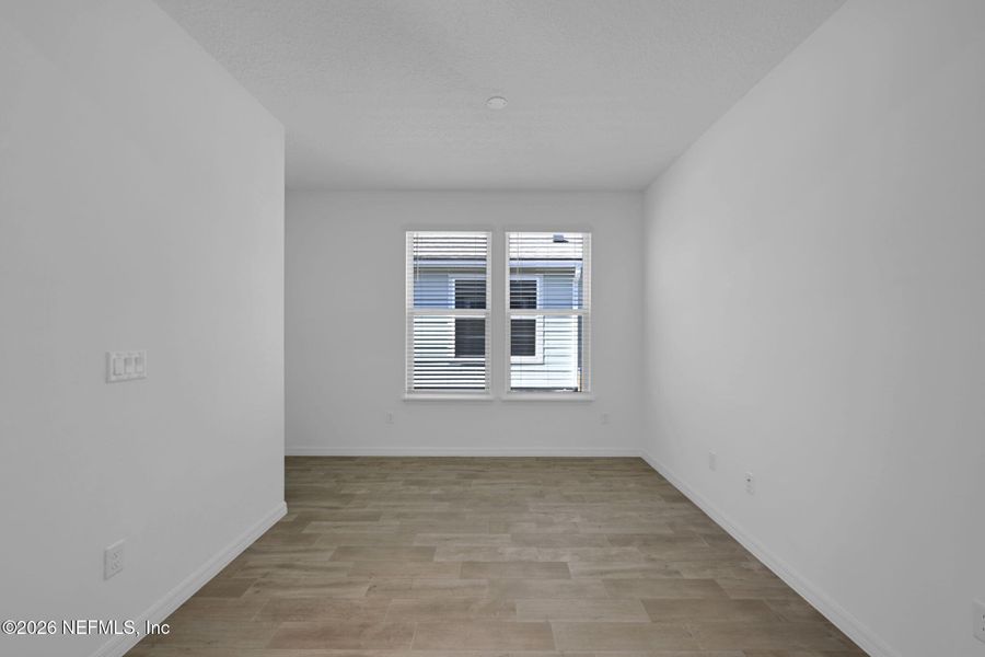Spacious, unfurnished interior of a new home in Del Webb Wildlight, Yulee (Image 21).