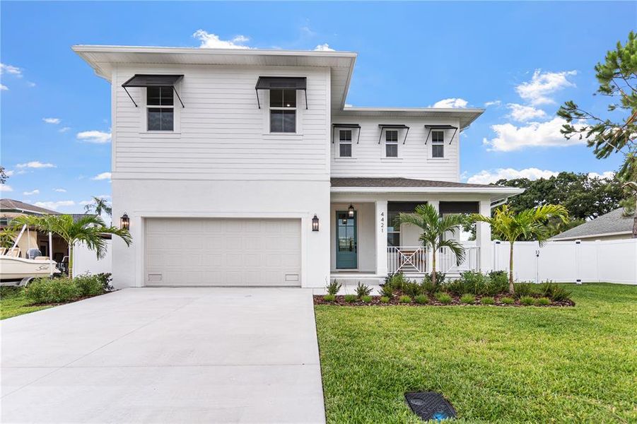 Front exterior of a new home in , Tampa, FL, highlighting curb appeal (Image 30). Front exterior of a new home in , Tampa, FL, highlighting curb appeal (Image 30).