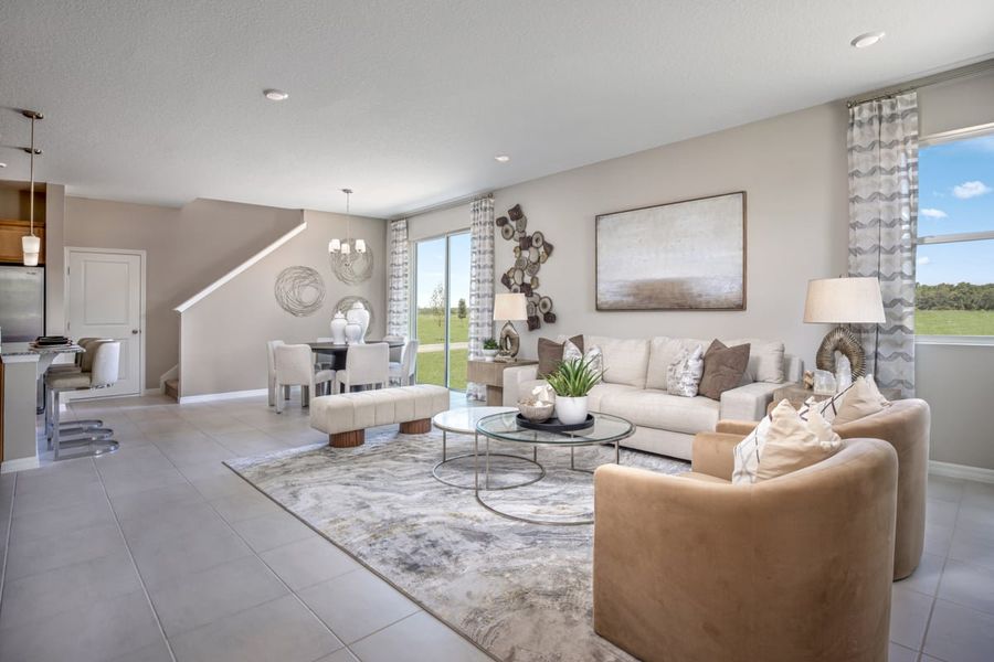 Representative furnished interior of a home built from the 1852 Modeled by KB Home in Canoe Creek Reserve I, St. Cloud (Image 6).