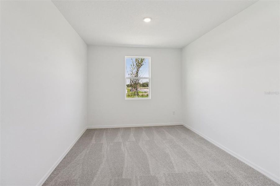 Spacious, unfurnished interior of a new home in Ardisia Park, New Smyrna Beach (Image 34).