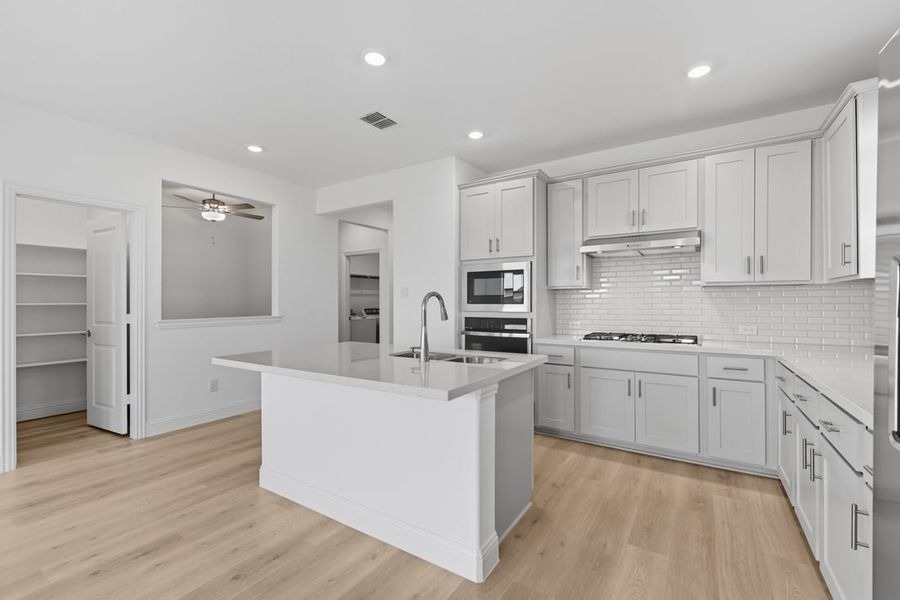 Representative furnished interior of a home built from the Rayburn by Taylor Morrison in Madero 50s, Fort Worth (Image 11).