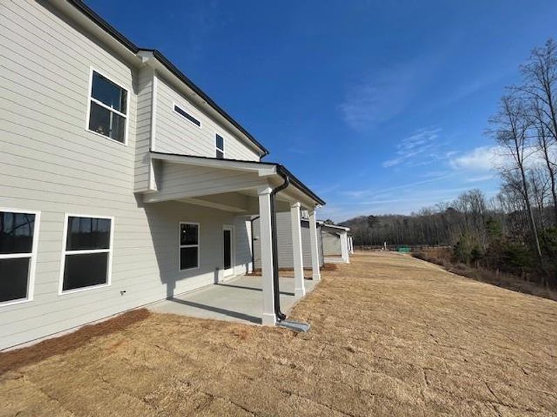 Exterior details and patio area of a home in Ponderosa Farms Estates, Gainesville (Image 4).