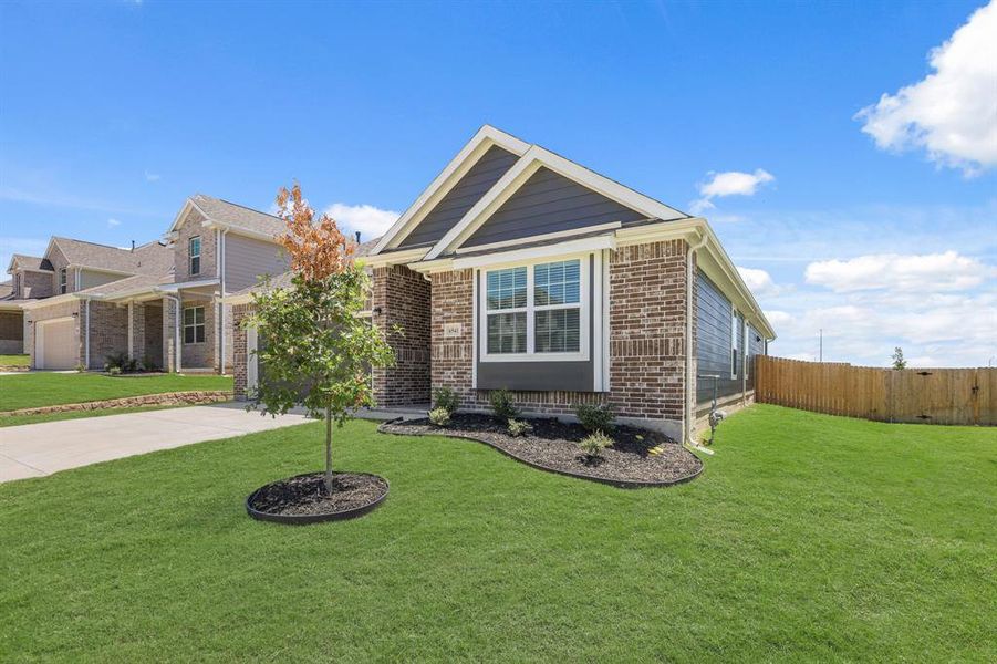 Front exterior of a new home in Rocky Creek Crossing, Fort Worth, TX, highlighting curb appeal (Image 2). Front exterior of a new home in Rocky Creek Crossing, Fort Worth, TX, highlighting curb appeal (Image 2).