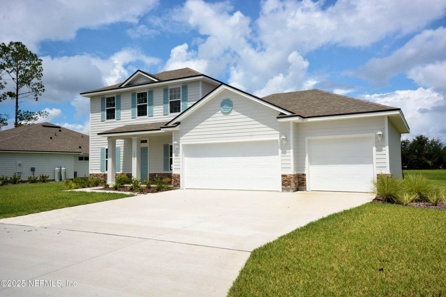 Front exterior of a new home in , Jacksonville, FL, highlighting curb appeal (Image 23).