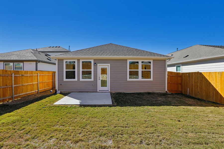 A house with a fence around it.