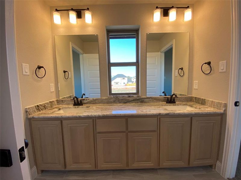 Jack & Jill bath 3 has separate dual dink vanity area with a window that makes in much easier to share Jack & Jill bath 3 has separate dual dink vanity area with a window that makes in much easier to share