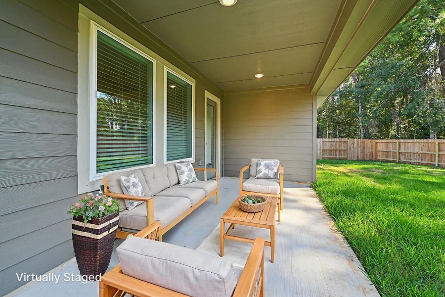 Exterior details and patio area of a home in , Conroe (Image 2).