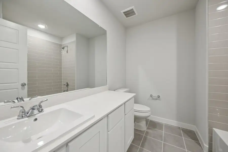 Bathroom in the Haylee home plan by Trophy Signature Homes - REPRESENTATIVE PHOTO Bathroom in the Haylee home plan by Trophy Signature Homes - REPRESENTATIVE PHOTO