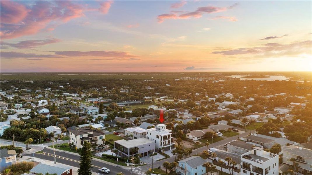 Front exterior of a new home in , New Smyrna Beach, FL, highlighting curb appeal (Image 2).