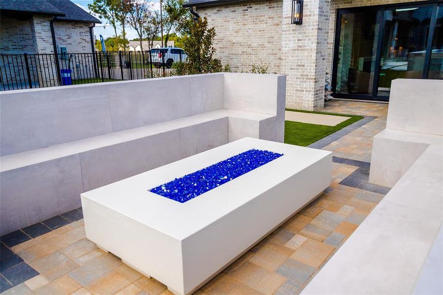 View of patio / terrace featuring a fire pit View of patio / terrace featuring a fire pit