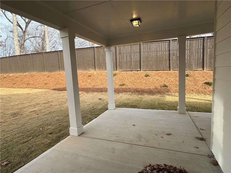 Exterior details and patio area of a home in Rosewood Lake Preserve, Hoschton (Image 3).