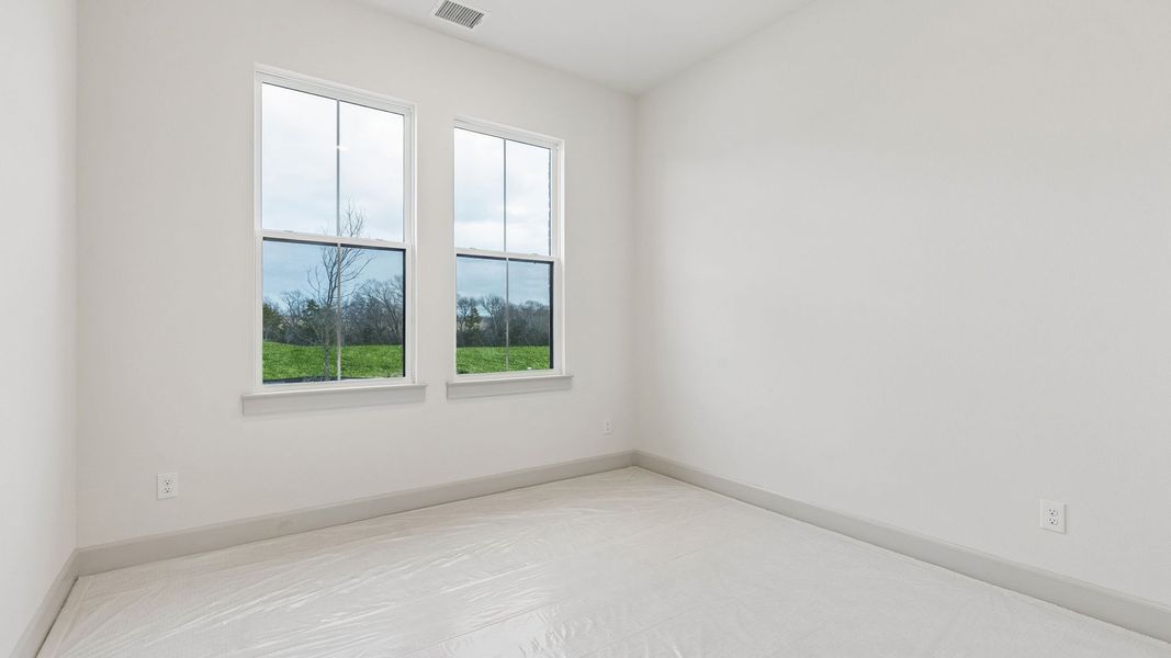 Representative unfurnished interior of a home built from the Toulouse II by Normandy Homes in Rainwater Crossing, Celina (Image 19).