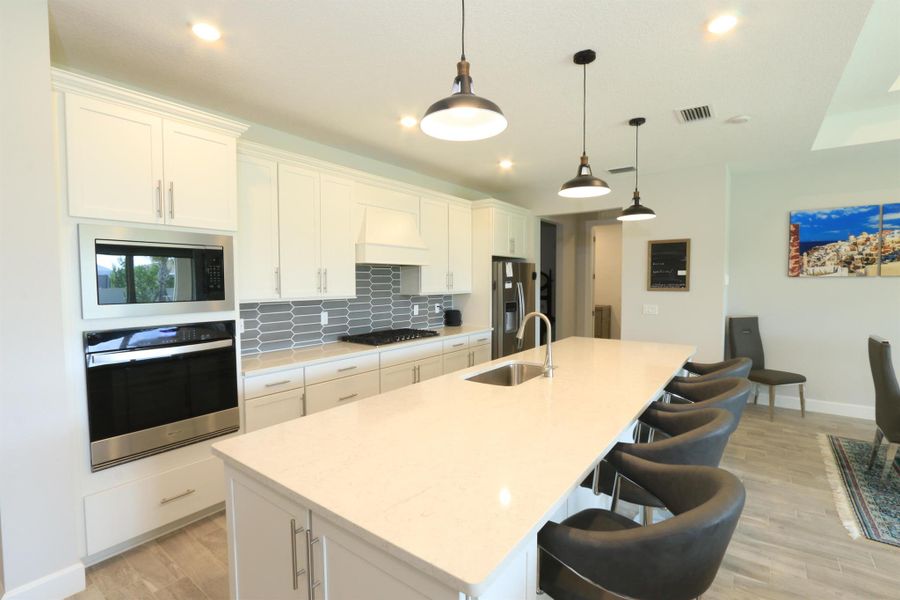 Furnished interior view inside a new home in Del Webb Tradition, Port St. Lucie (Image 24).