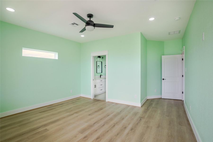 Large master bedroom with private bath. Side window for privacy and natural light galore!