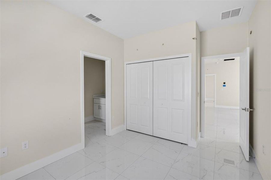 Spacious, unfurnished interior of a new home in , Port Charlotte (Image 27).