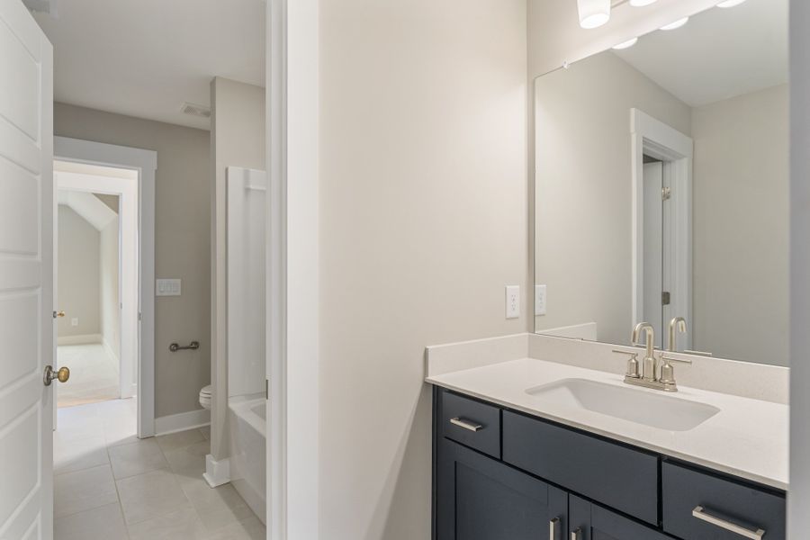 Representative furnished interior of a home built from the Riggs by Hunter Quinn Homes in Landing at Clemson Marina, Seneca (Image 8).