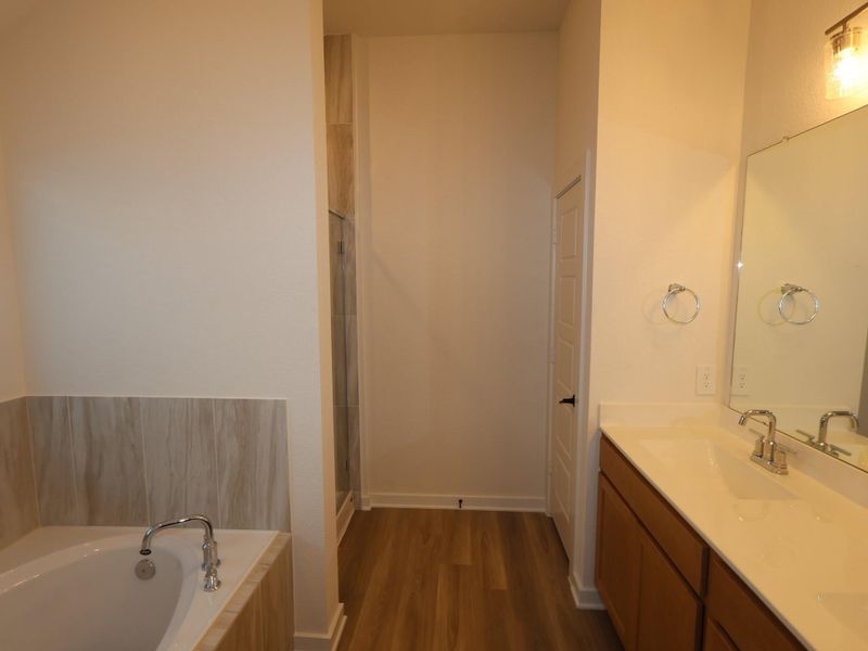 Furnished interior view inside a new home in Lone Star Landing, Montgomery (Image 10).