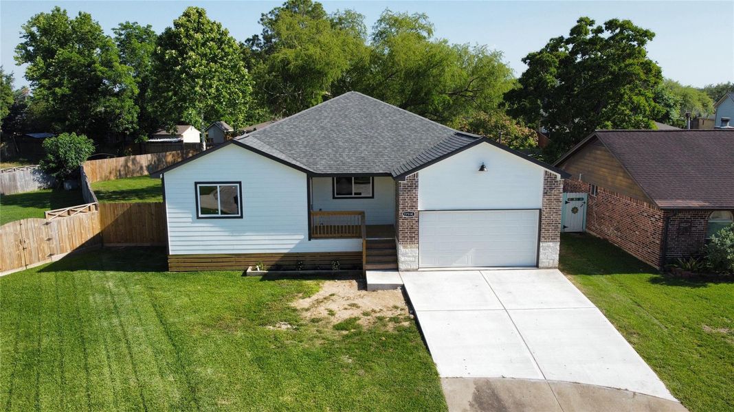 Front exterior of a new home in , Houston, TX, highlighting curb appeal (Image 15).