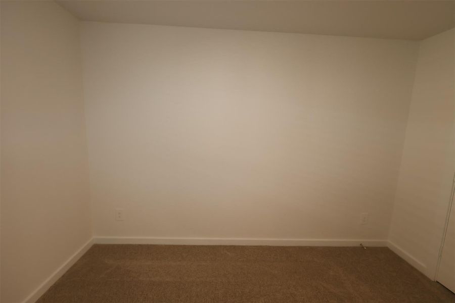 Spacious, unfurnished interior of a new home in Pinewood at Grand Texas, New Caney (Image 14).