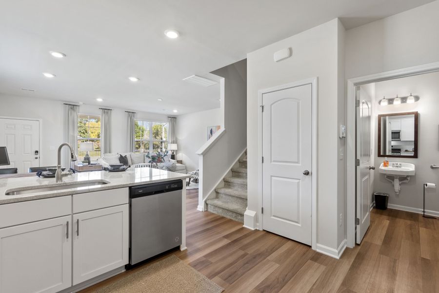 A large kitchen with white cabinets.