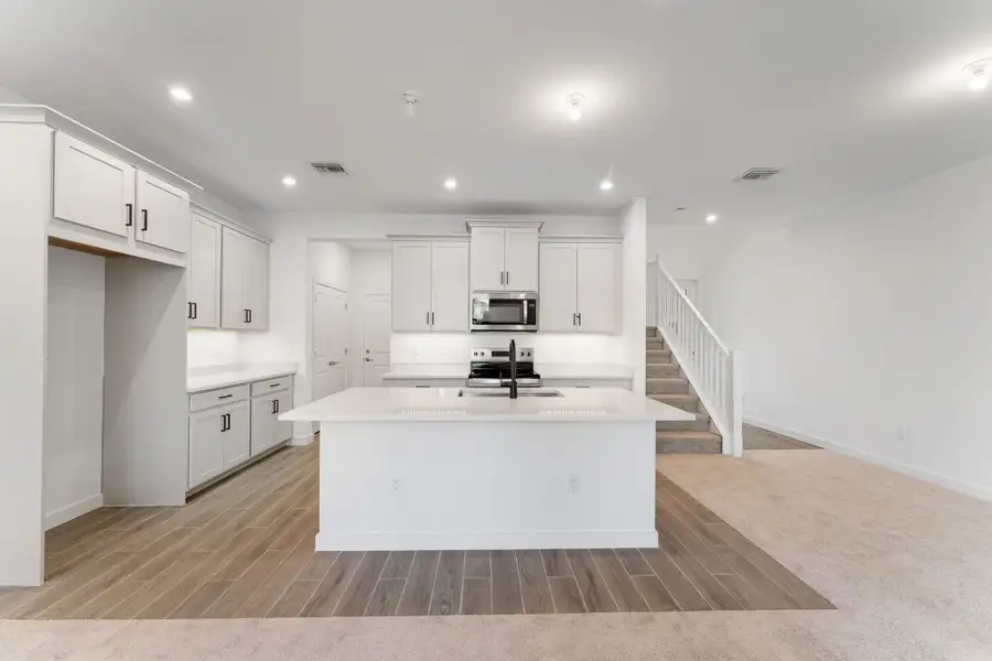 Furnished interior view inside a new home in Forest – Townhomes, Lake Worth (Image 3). Furnished interior view inside a new home in Forest – Townhomes, Lake Worth (Image 3).