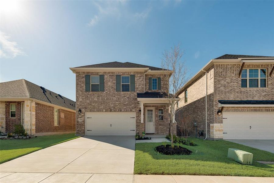 Front exterior of a new home in Walden Pond, Forney, TX, highlighting curb appeal (Image 20).