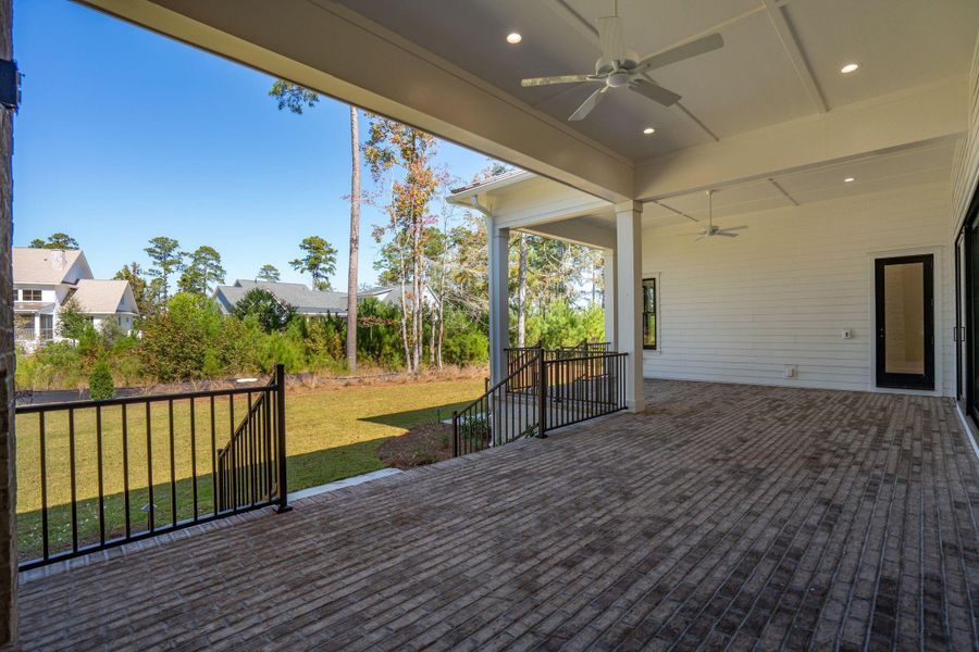 Exterior details and patio area of a home in , Ravenel (Image 1).