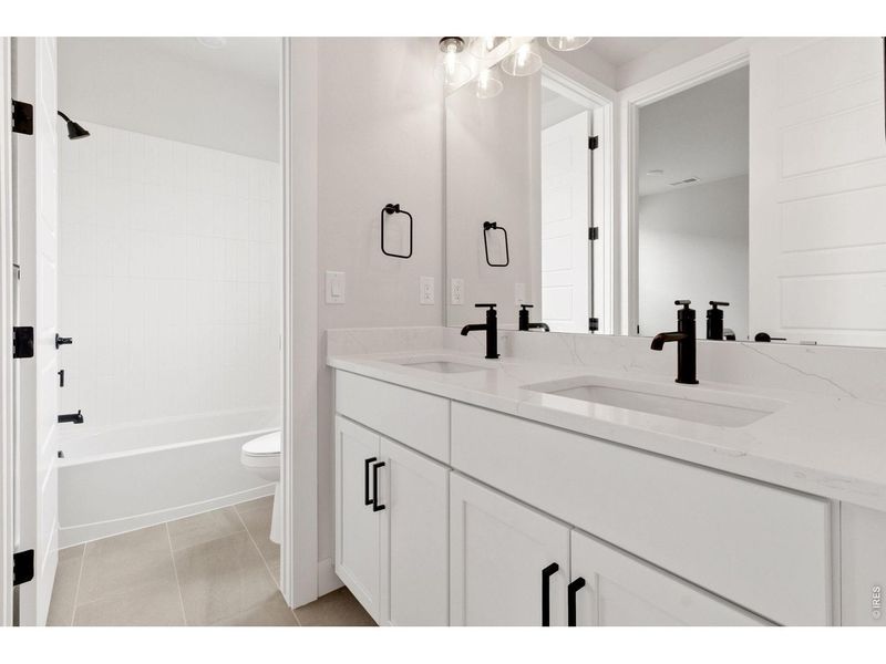 Furnished interior view inside a new home in RainDance, Windsor (Image 6).