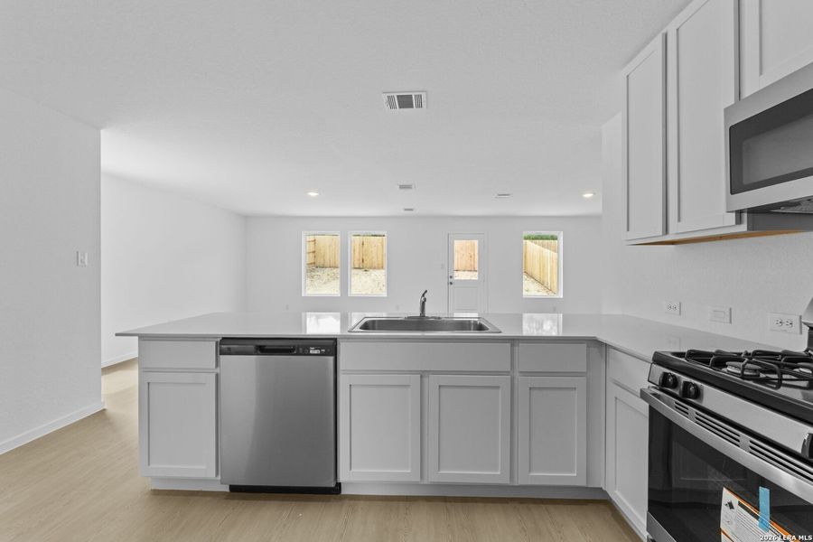 Furnished interior view inside a new home in Waterwheel, San Antonio (Image 14).