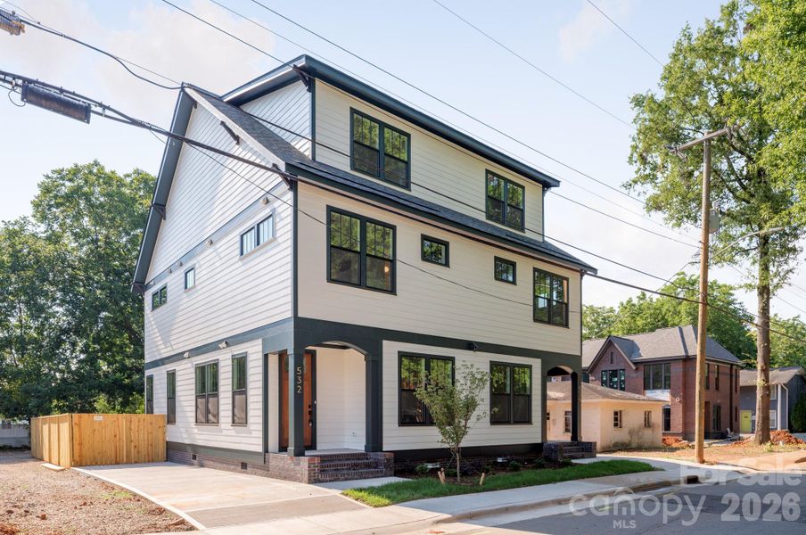 Front exterior of a new home in , Charlotte, NC, highlighting curb appeal (Image 2). Front exterior of a new home in , Charlotte, NC, highlighting curb appeal (Image 2).
