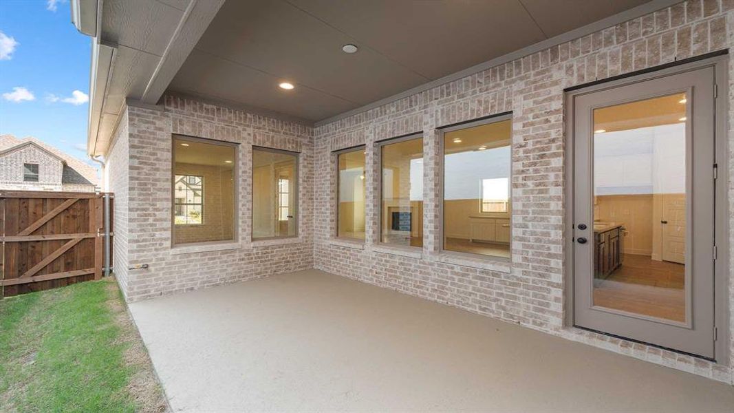 Exterior details and patio area of a home in The Parks At Wilson Creek 40', Celina (Image 19). Exterior details and patio area of a home in The Parks At Wilson Creek 40', Celina (Image 19).